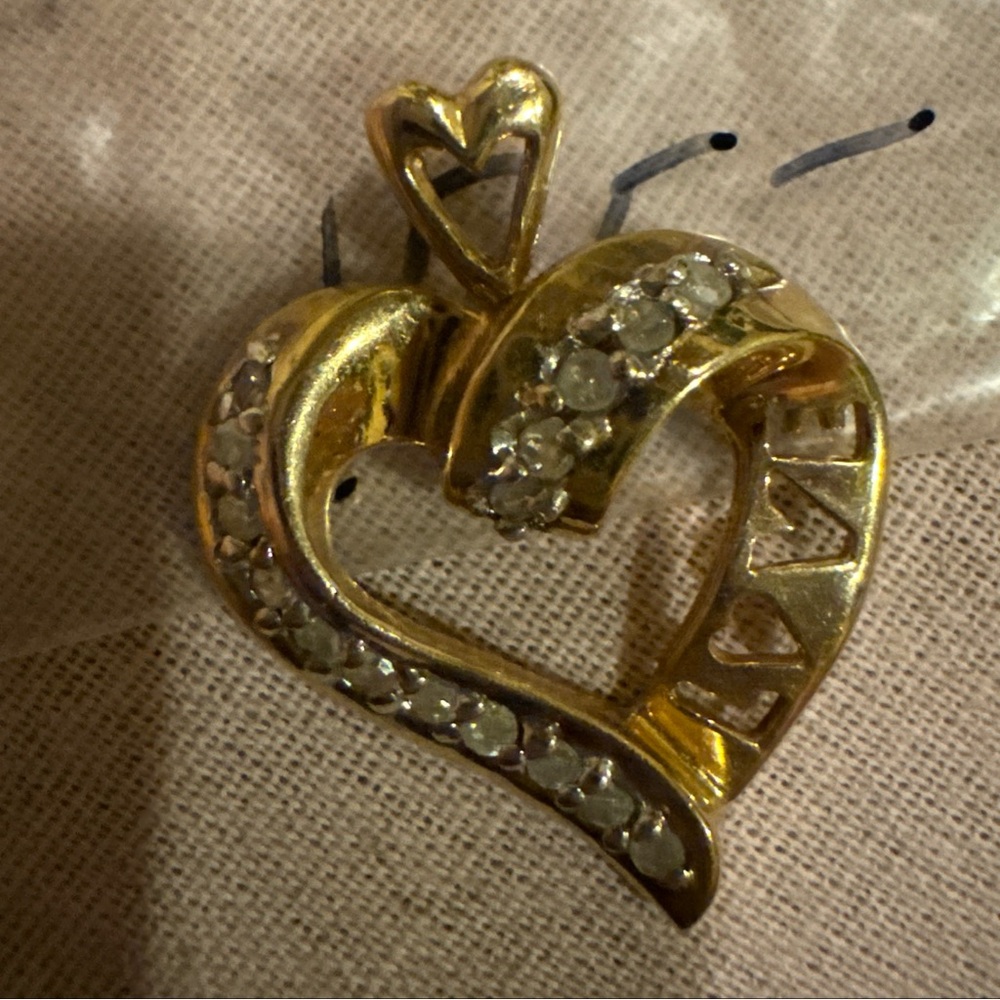 14k 10k REAL GOLD!!!!!Lmk which one u want the price on loves?